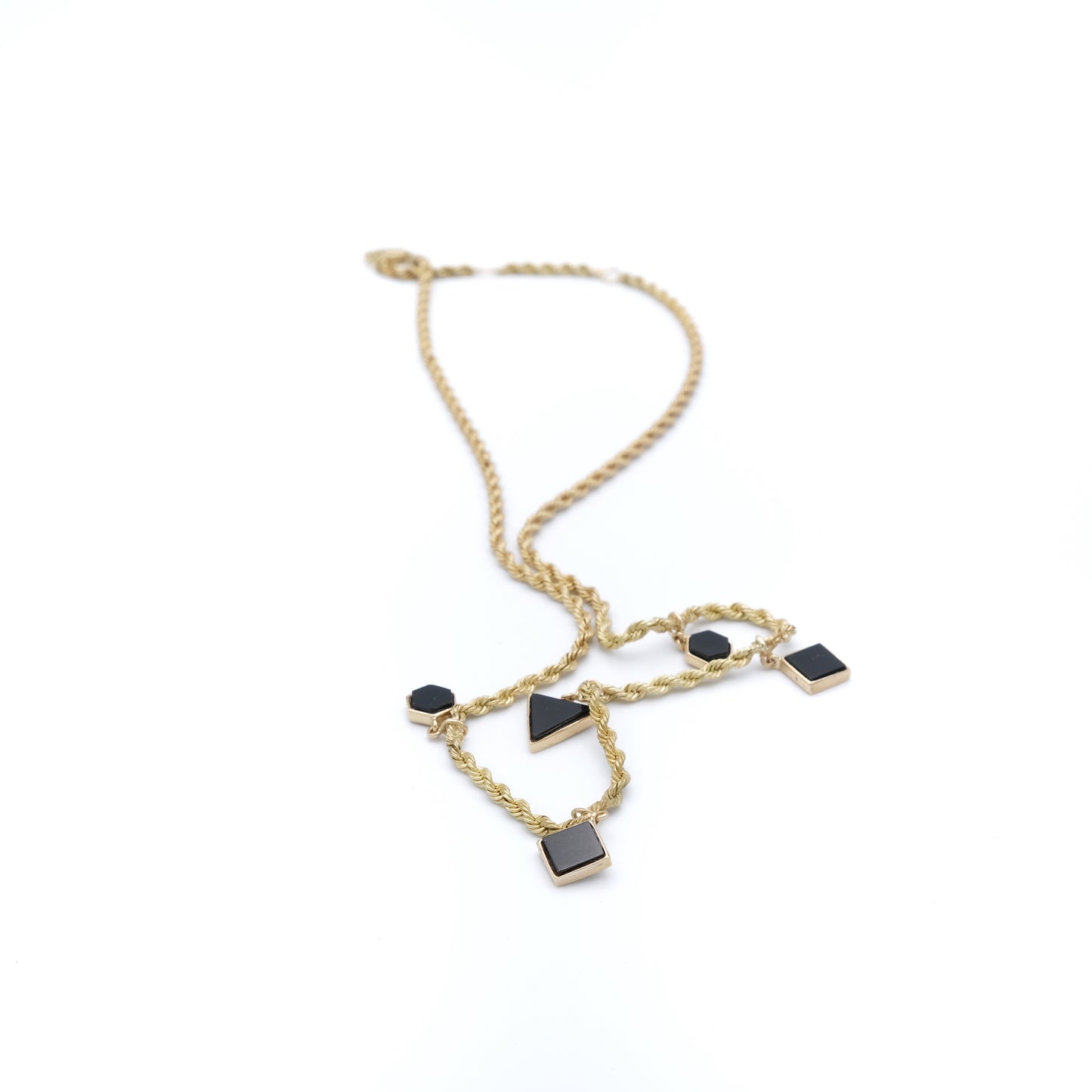 Gold necklace with black stones