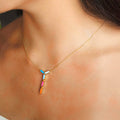 Necklace with colorful pendant on a person's neck