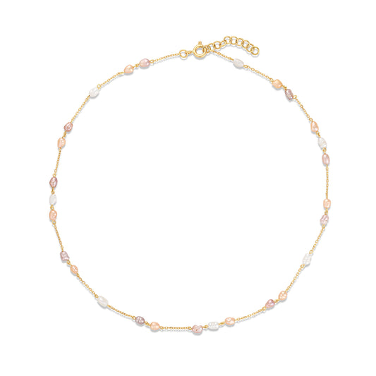 Gold necklace with pearls on a white background