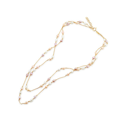 Two-layered pearl necklace on a white background