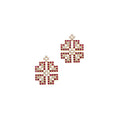 Pair of earrings with red gemstones on a white background