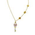 18k gold key-shaped necklace with pearl