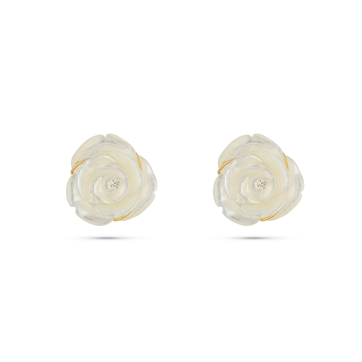 Pair of white floral earrings with gold accents on a white background