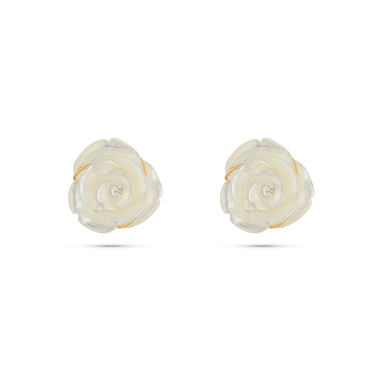 Pair of white floral earrings with gold accents on a white background