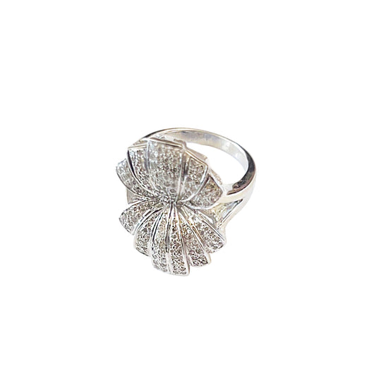 Gold ring with diamond fan design on a white background
