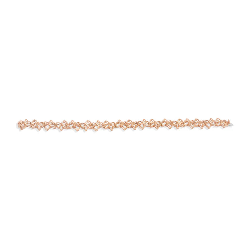 Rose gold bracelet on a white background