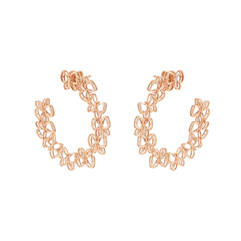 Rose gold hoop earrings on a white background