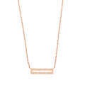 Rose gold necklace with a horizontal bar pendant on a white background