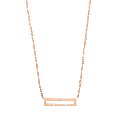 Rose gold necklace with a horizontal bar pendant on a white background