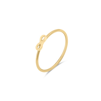 Gold ring with a small infinity symbol on a white background