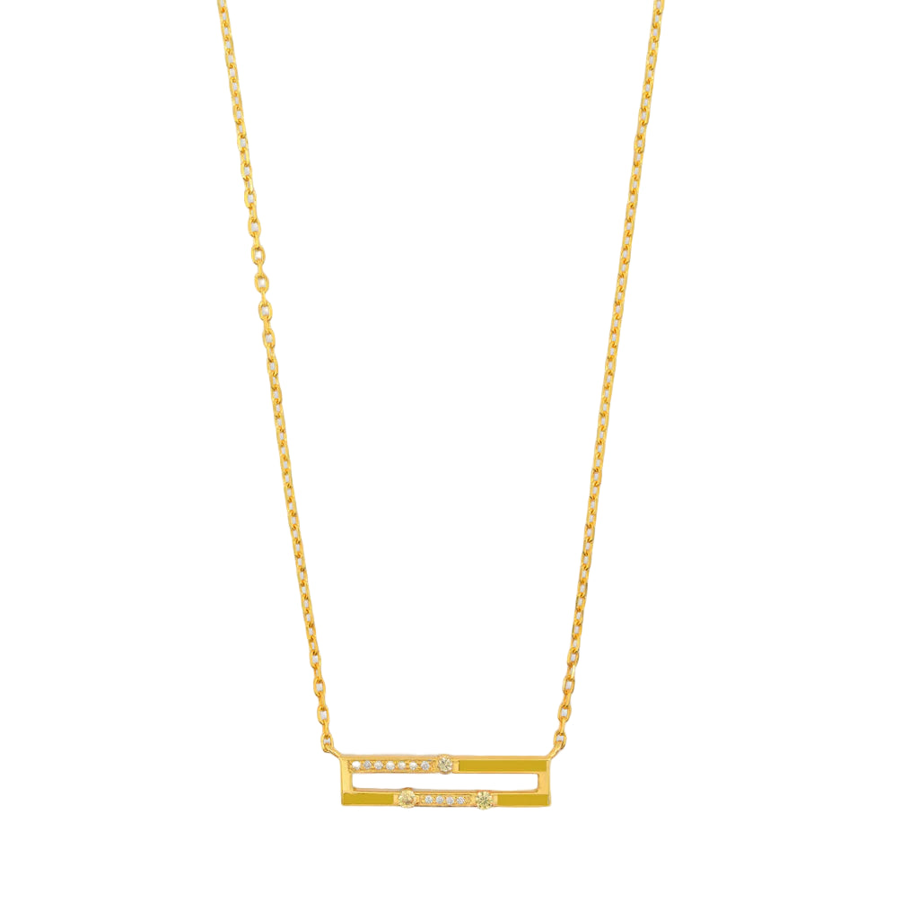 Gold necklace with a bar pendant on a white background