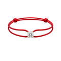 Red string bracelet with a diamond on a white background