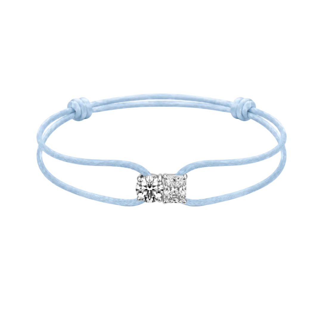 Light blue bracelet with a square charm on a white background