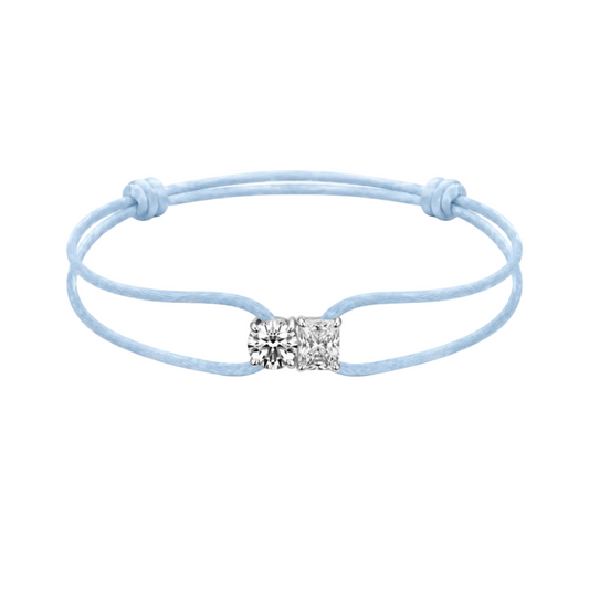 Light blue bracelet with a square charm on a white background