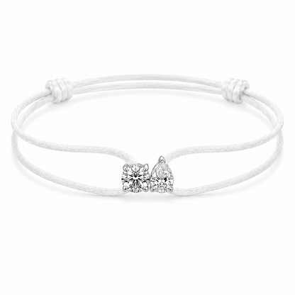 White bracelet featuring diamonds background