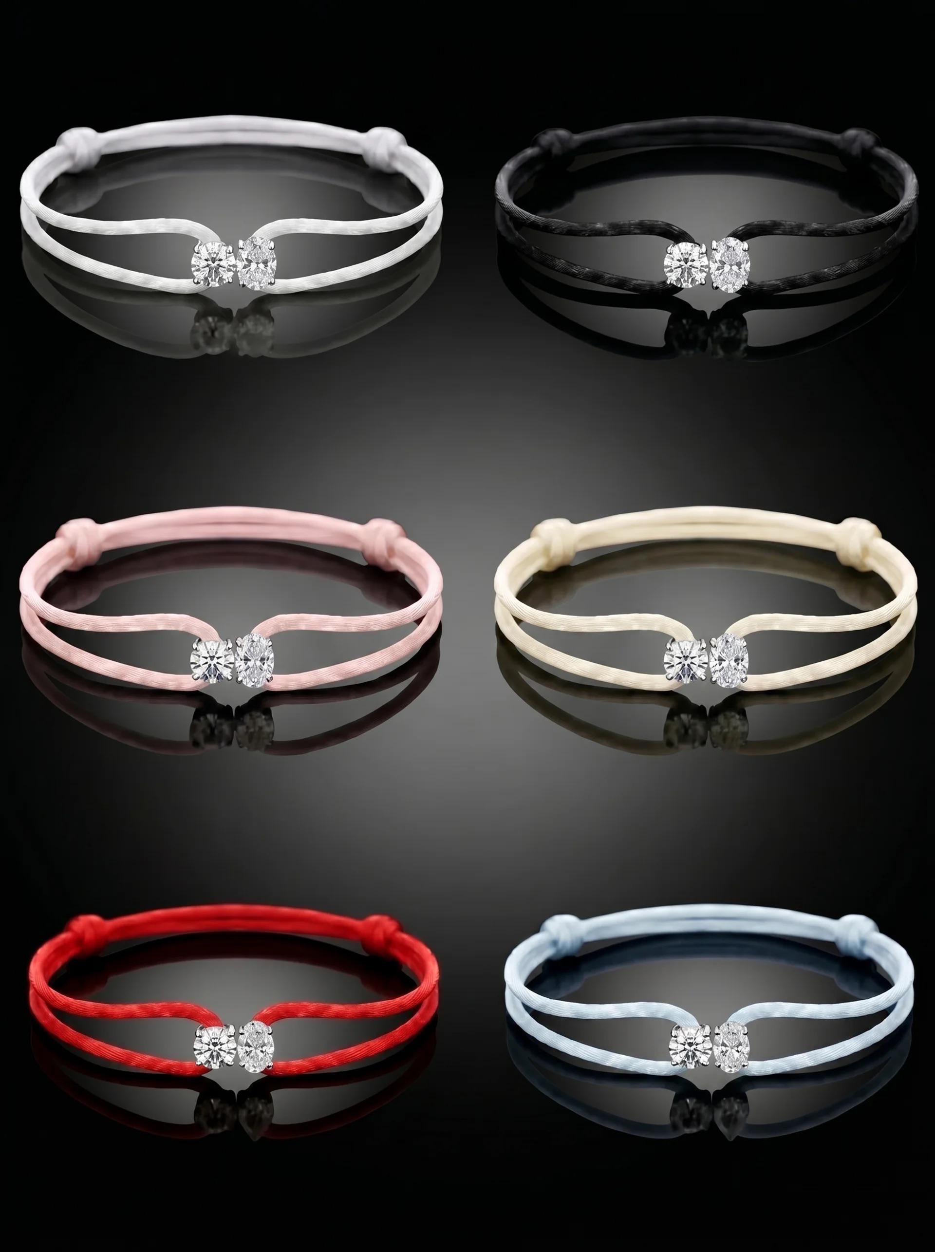 Set of six bracelets in different colors on a black background