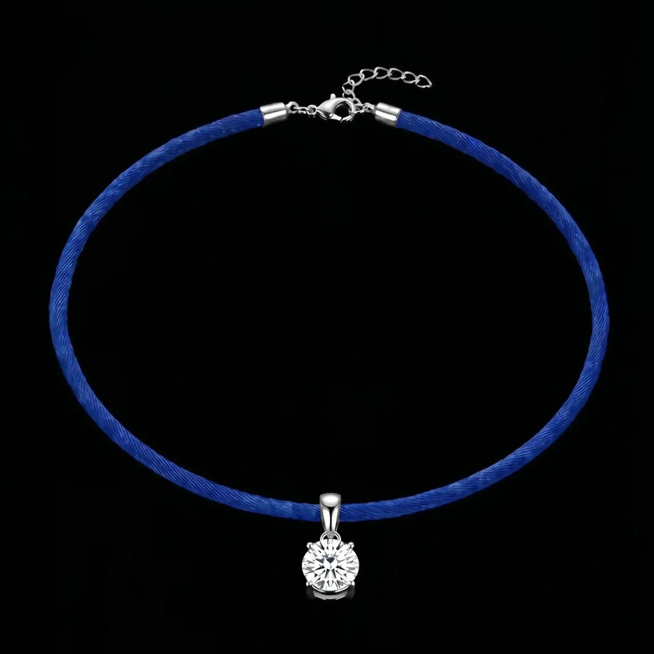 Blue choker necklace with a silver pendant on a black background