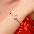 18k rose gold open bangle with a ruby heart and diamond-set star, additional view