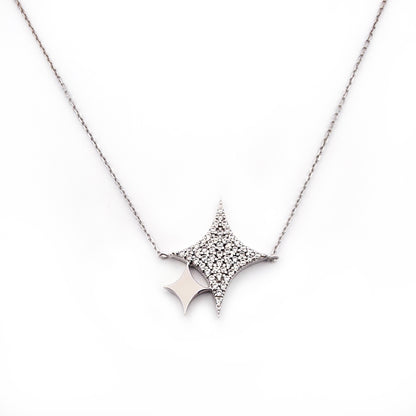 Star-shaped diamond necklace on a white background
