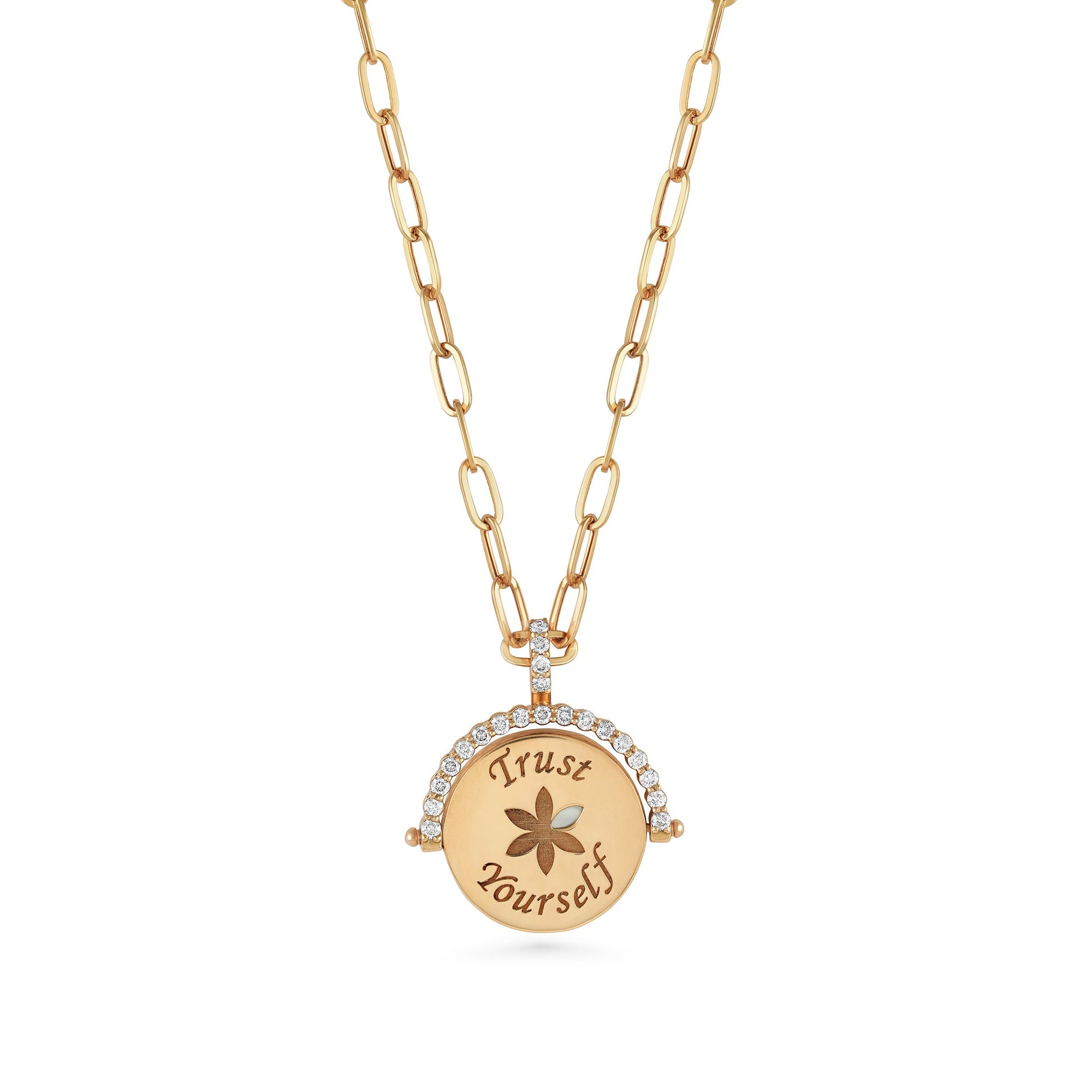 Gold necklace with a pendant that says 'Trust Yourself' on a white background