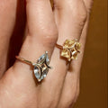 Gold ring with gemstone on a white background