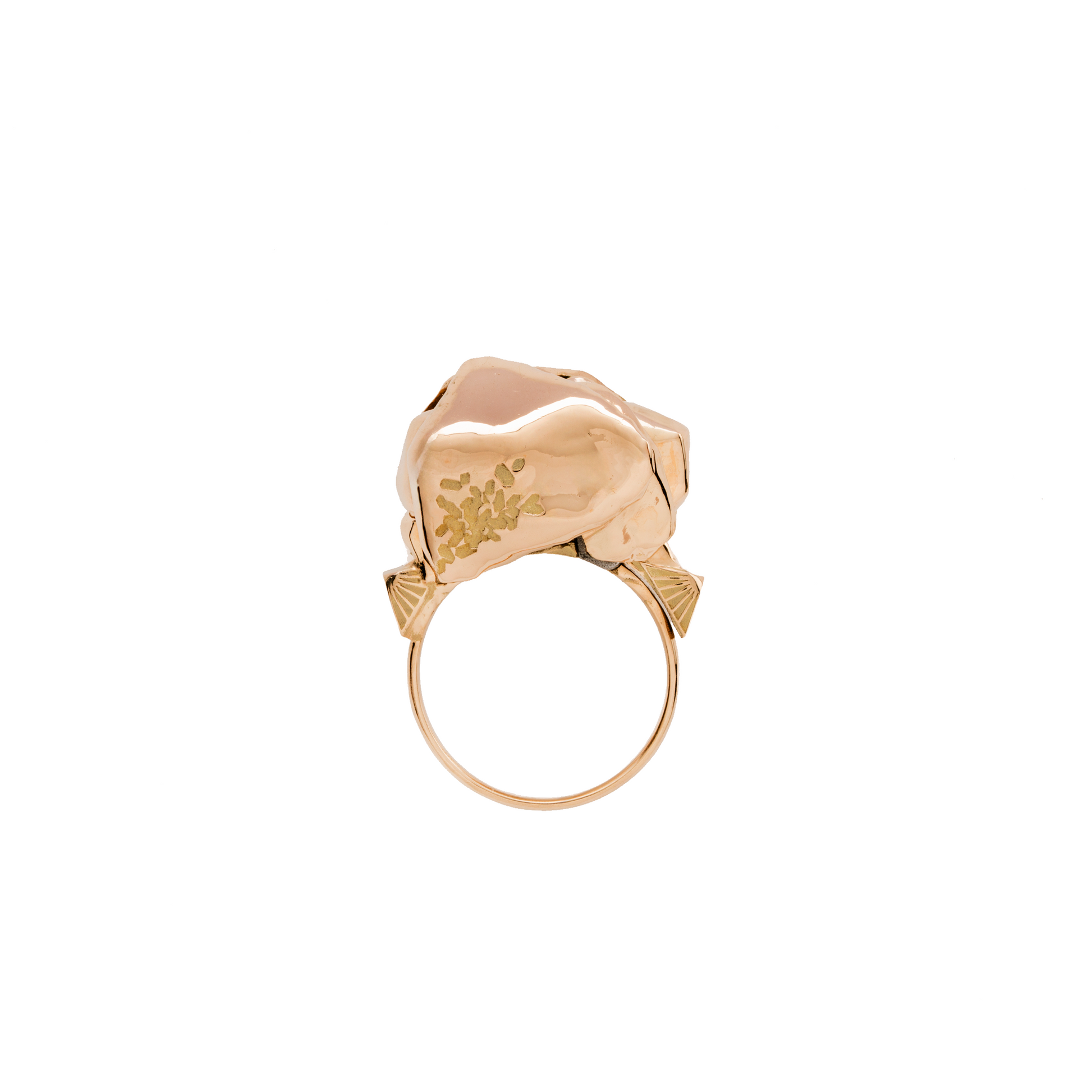 Gold ring with a unique design on a white background