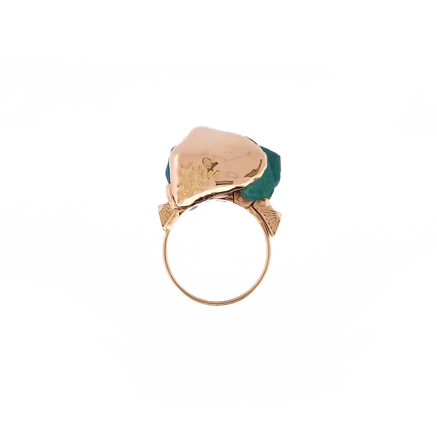Gold earring with a green gemstone on a white background