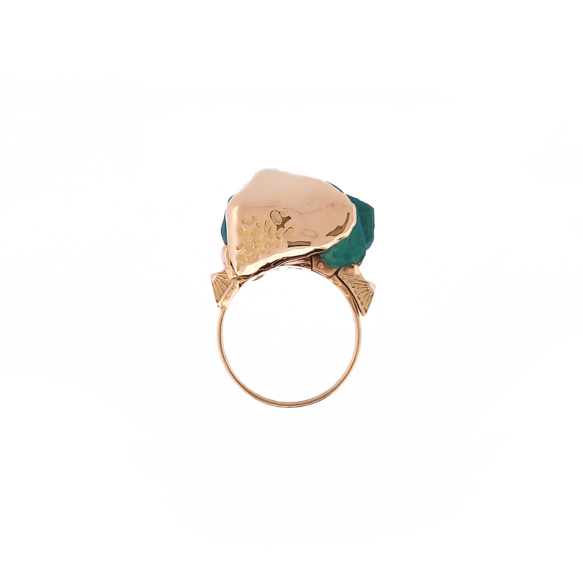 Gold earring with a green gemstone on a white background