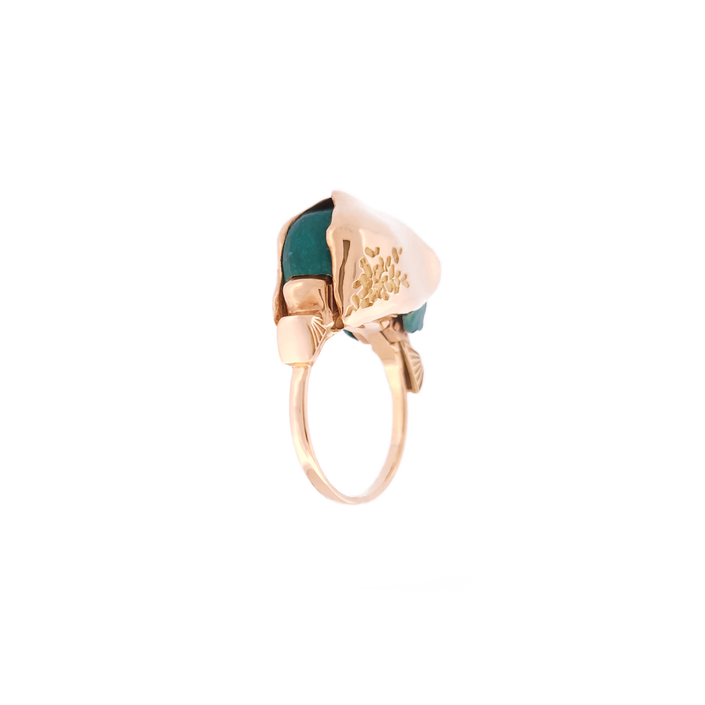 Gold ring with a diamond on a white background