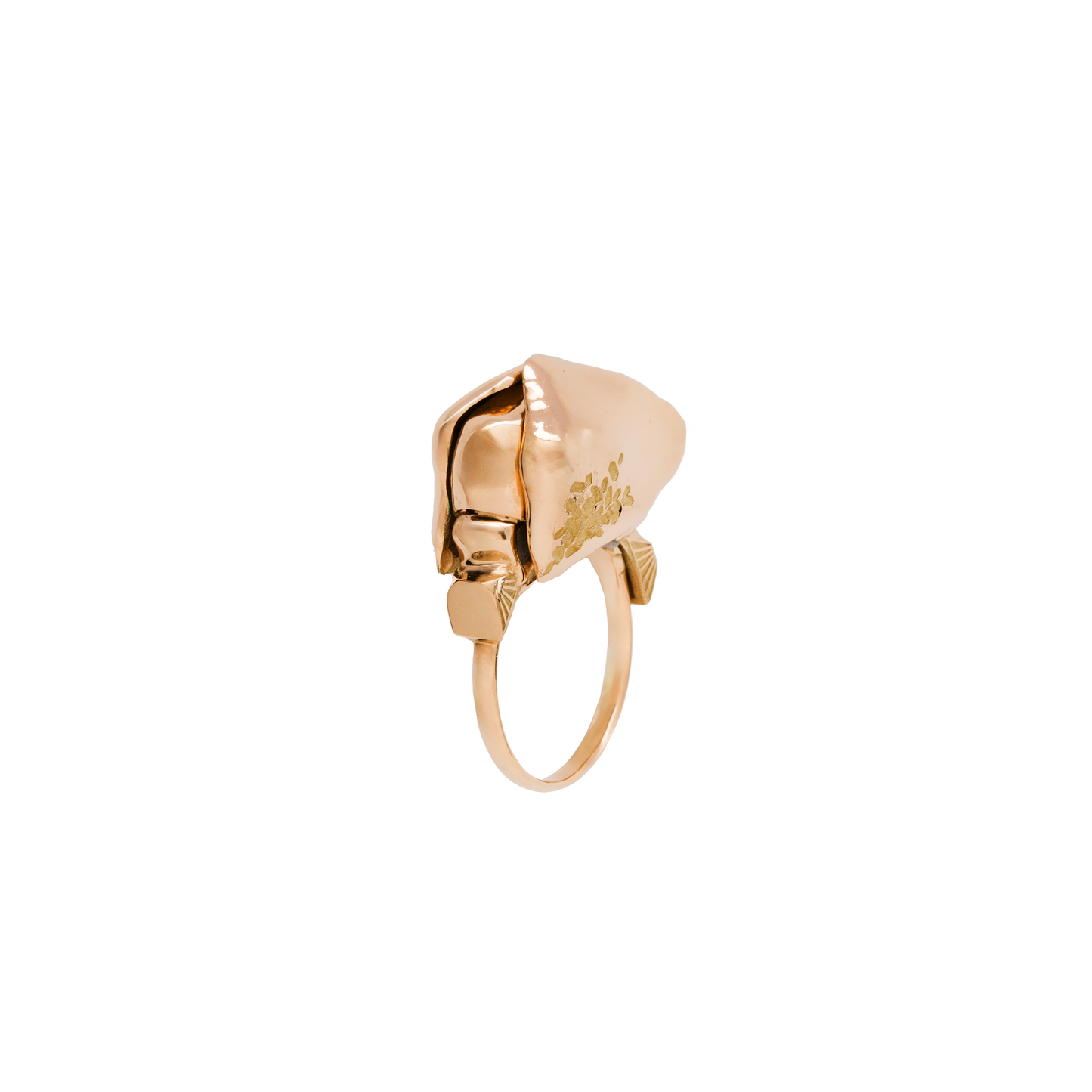 Gold ring with a unique design on a white background