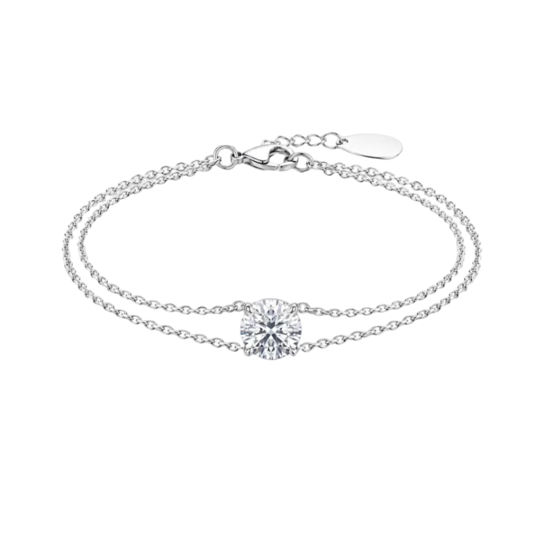 White gold bracelet with a round diamond on a white background