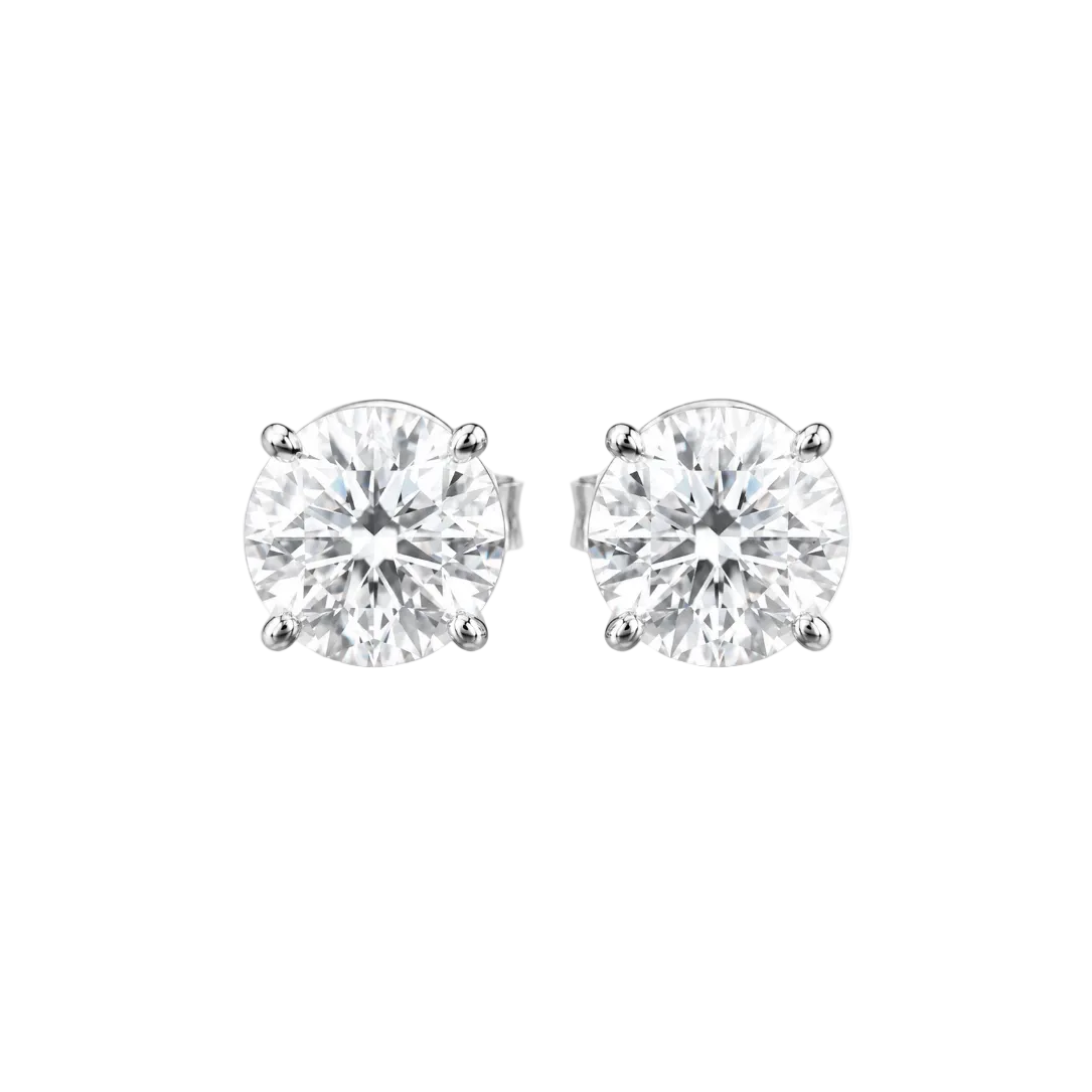 Pair of diamond stud earrings on a white background