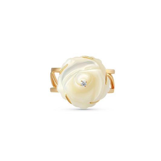 Gold ring with a white stone on a white background