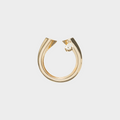 Gold ring with geometric design and teardrop-shaped diamond