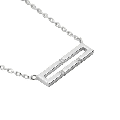 White gold necklace with a rectangular pendant on a white background