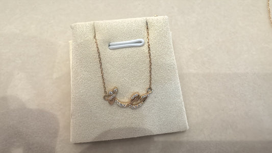 Abalii curved calligraphy necklace, original reference photograph