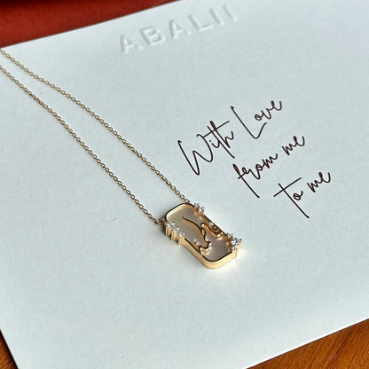 ABALII Hikayat Sadaf Al-Nujoom 18K yellow gold necklace front