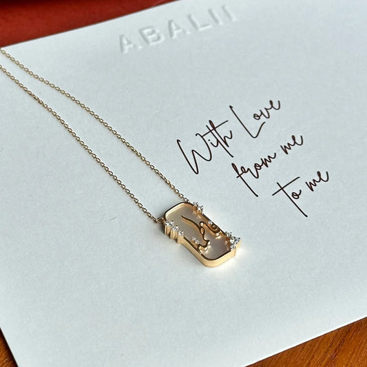 ABALII Hikayat Sadaf Al-Nujoom 18K yellow gold necklace front