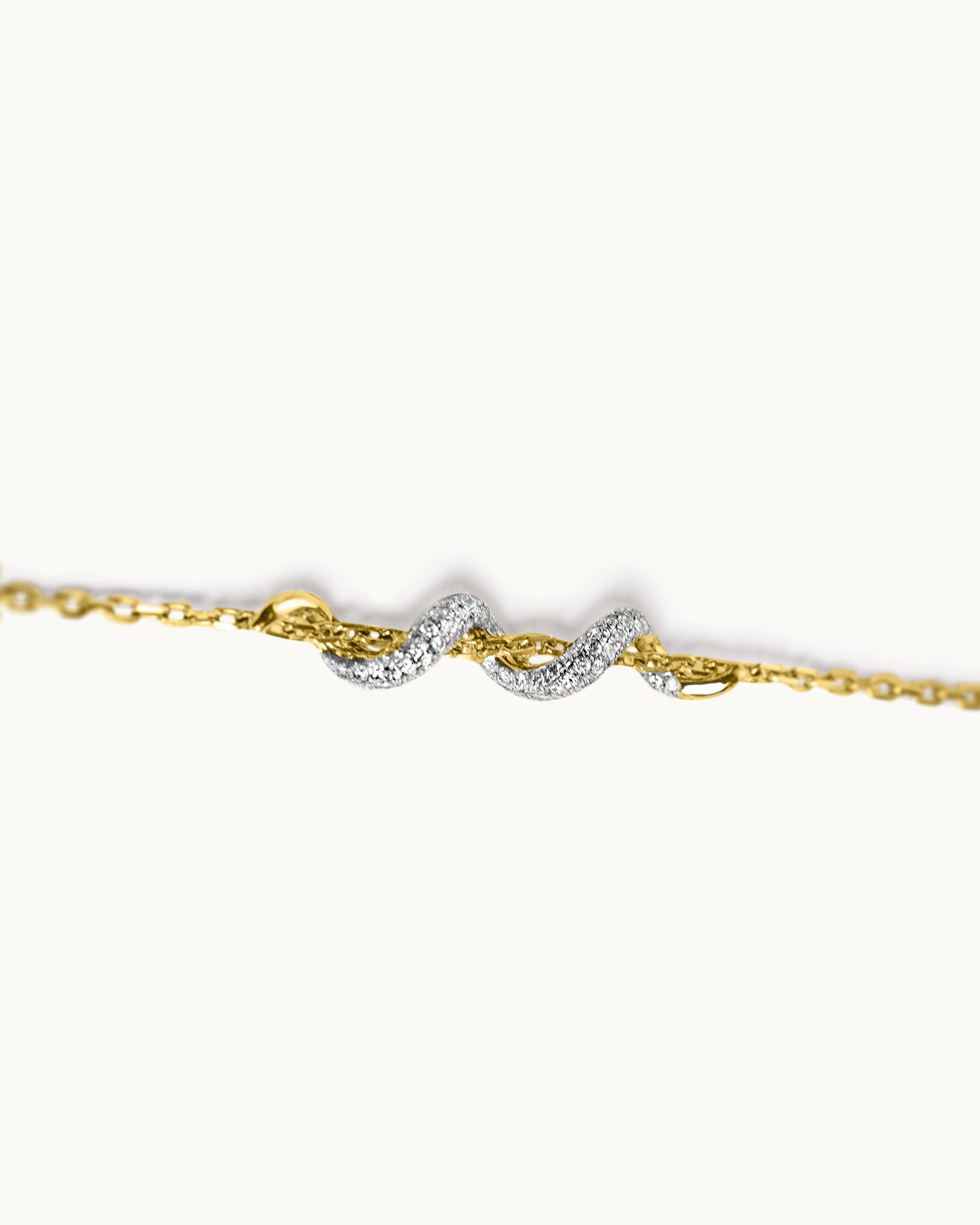 ALLAMI Spiral Bracelet by SAORA in yellow gold, diamond detail