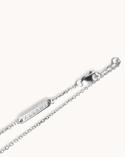 ALLAMI Spiral Necklace by SAORA in white gold, brand clasp detail
