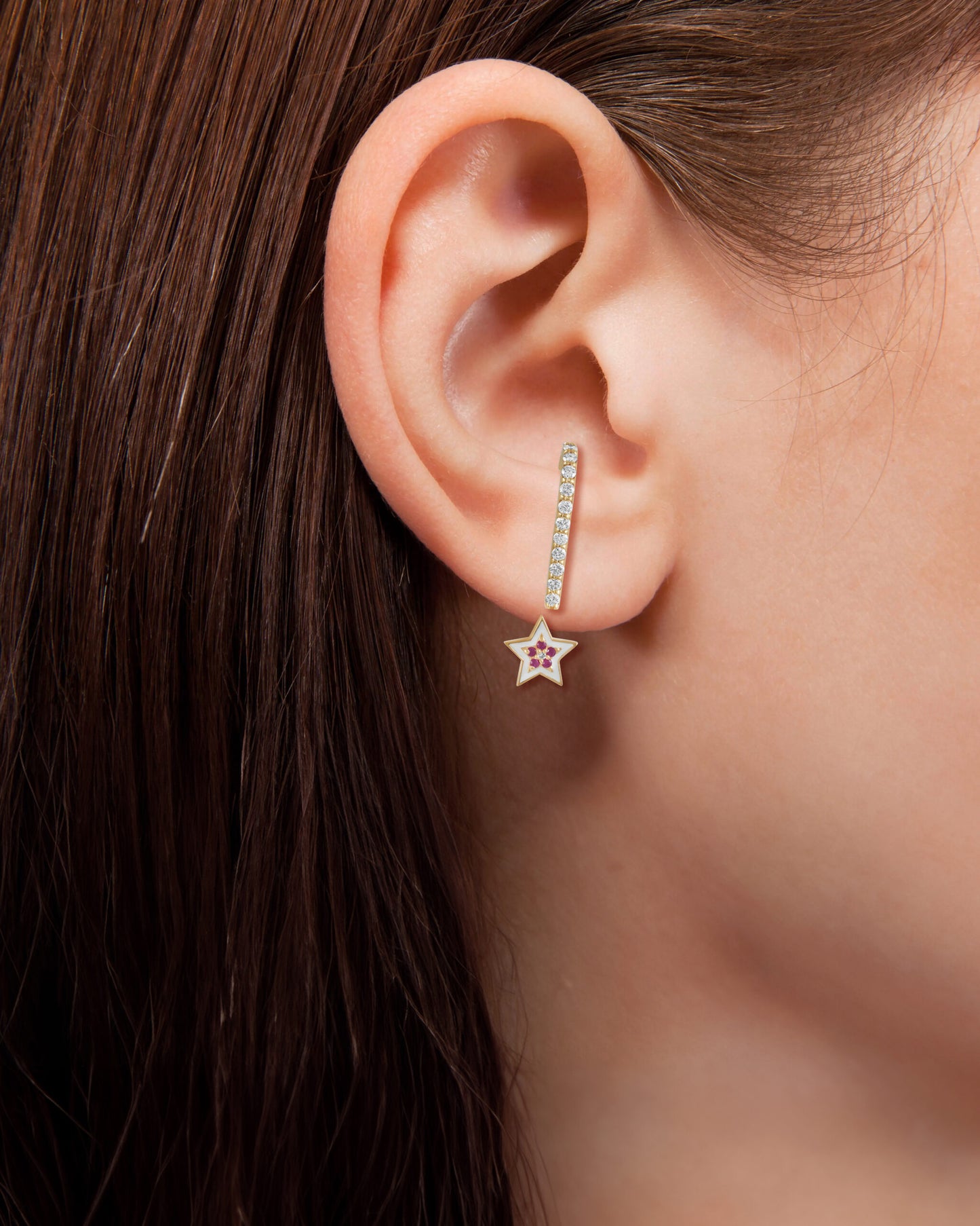 By2wenty5 Charm Earrings styled on ear