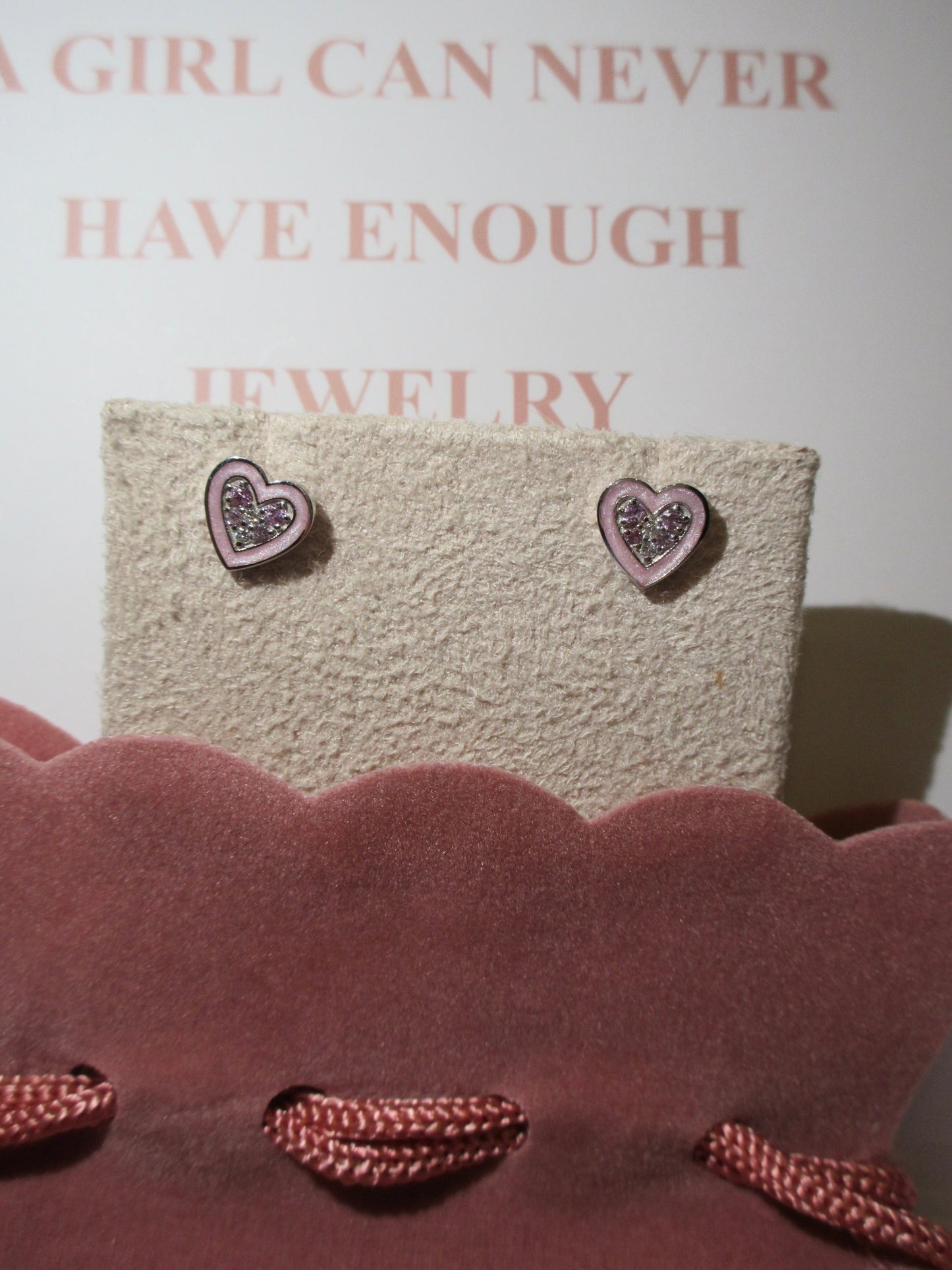 By2wenty5 Heart Studs displayed on a jewellery stand