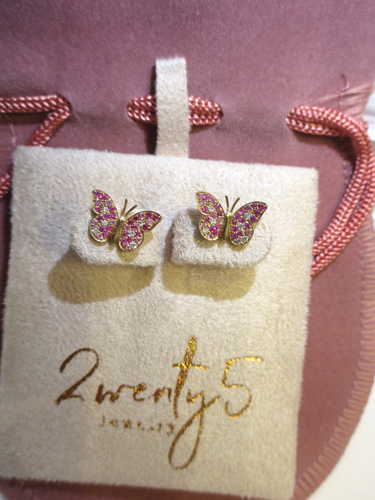 By2wenty5 Large Butterfly Studs displayed on a jewellery pouch