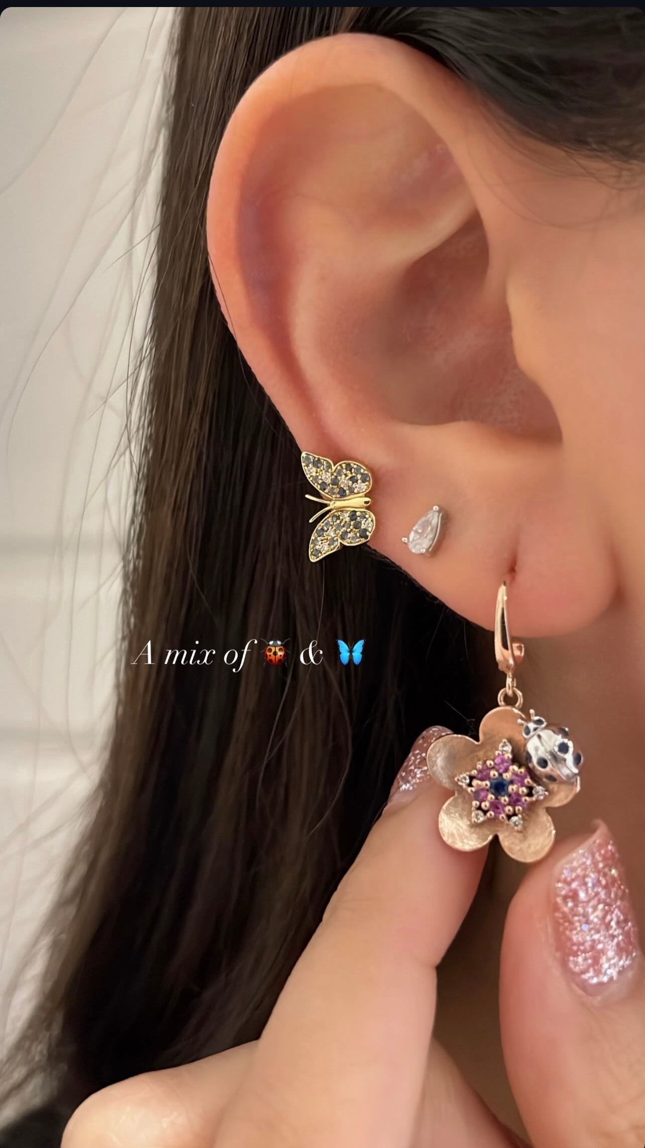 By2wenty5 Large Butterfly Studs worn in an ear stack