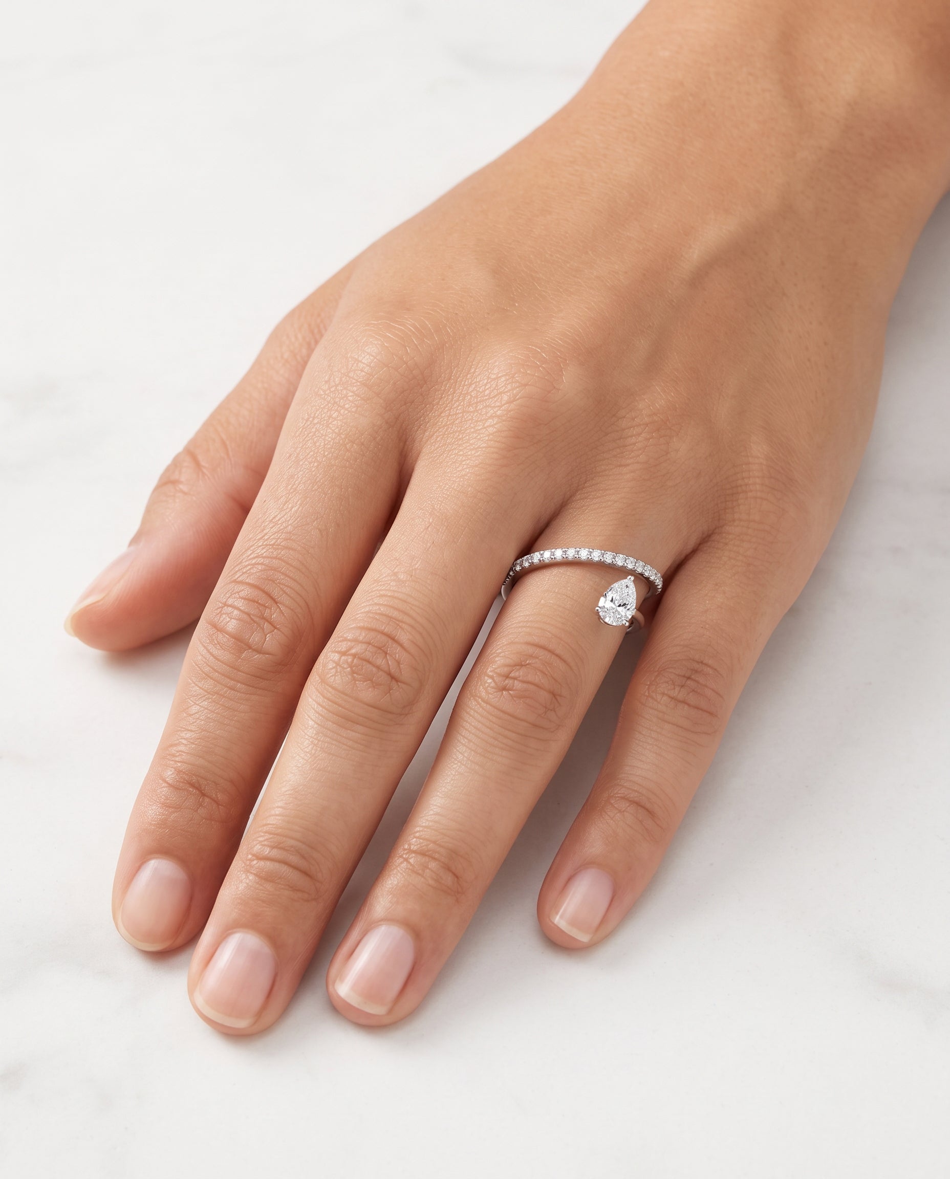 Caleums Hidden Orbit 18K White Gold Ring