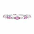 Caleums Pink Aura Eternity Ring in 18k white gold with pink sapphires and diamonds on a white background