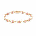 Caleums Sapphire Grace gold and pink sapphire bracelet on a white background