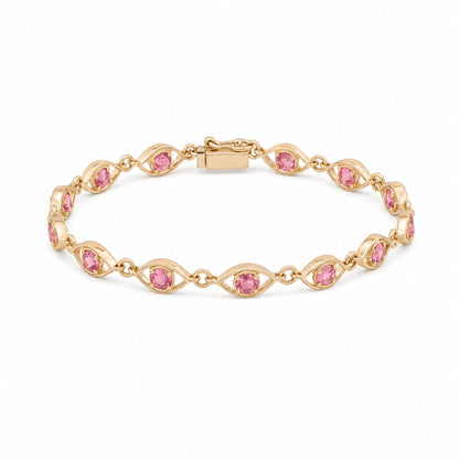 Caleums Sapphire Grace gold and pink sapphire bracelet on a white background
