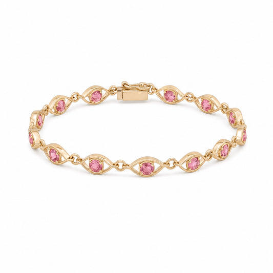 Caleums Sapphire Grace gold and pink sapphire bracelet on a white background