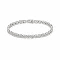 Caleums Yin and Yang white gold diamond bracelet on a white background